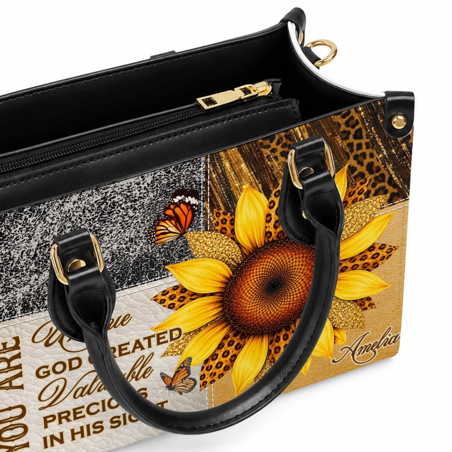 Close up view of the black interior and golden zipper detail on a personalized sunflower design PU leather handbag.
