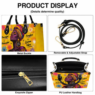 Product display of a personalized black queen handbag showing metal buckles, adjustable straps, zipper details, and leather material.