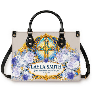 Personalized handbag for Layla Smith featuring a gold cross, blue floral design, and the quote God is within her.