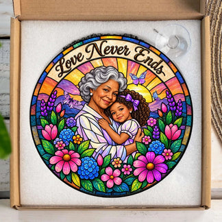 Custom Love Never Ends stained glass suncatcher inside a gift box, featuring a grandmother and granddaughter.