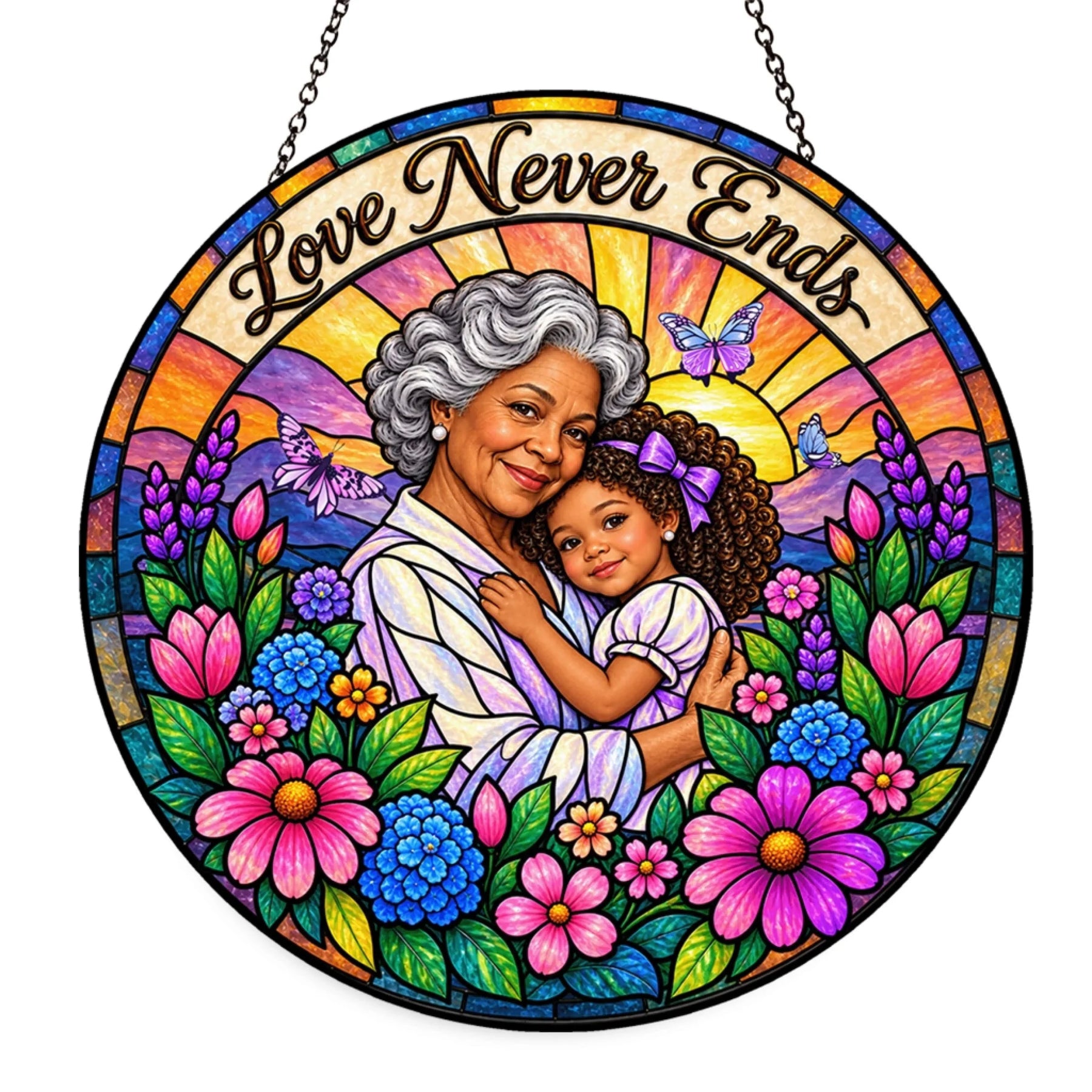 A beautiful stained glass suncatcher featuring a grandmother and granddaughter with flowers and the quote Love Never Ends.