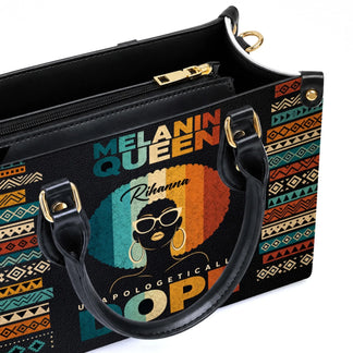 Personalized Melanin Queen handbag with Rihanna name featuring a colorful afro graphic and patterned side panels.