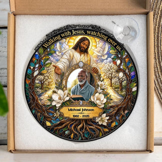 Custom memorial suncatcher with a photo of a loved one and Jesus in a gift box with a hanging suction cup attachment.