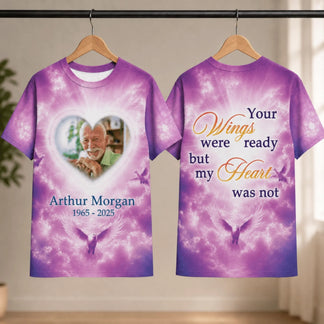 Custom memorial t-shirt with a heart photo frame, name, dates, and doves on a beautiful purple sky background.