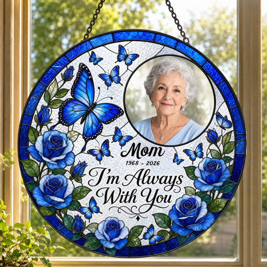 Personalized memorial stained glass suncatcher featuring a custom photo of Mom, blue roses, butterflies, and dates.