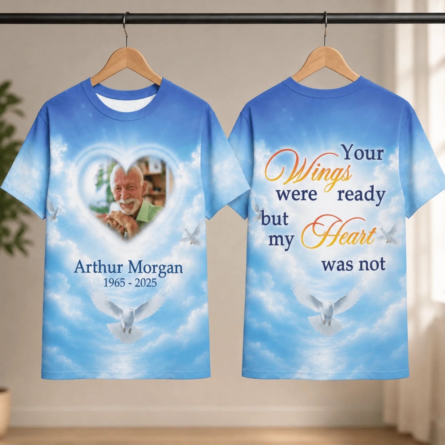 Custom memorial t-shirt with photo, name, and dates in a blue sky heaven theme with dove and heart design.