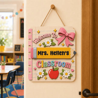 Personalized wooden classroom door sign for teachers featuring a cute pencil, apple, and bow design for back to school.