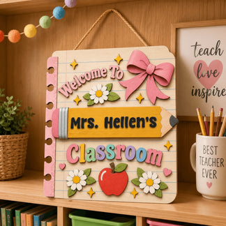 Custom classroom sign for teachers with pencil and apple artwork displayed on a wooden shelf, perfect for school.