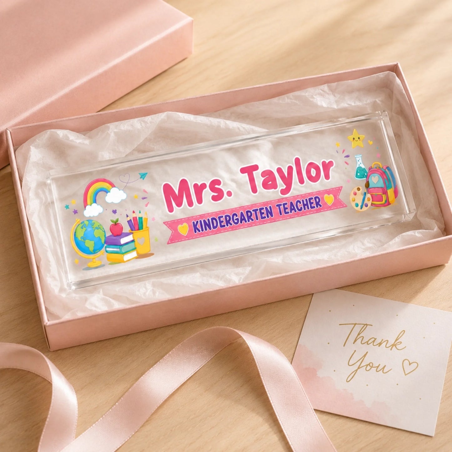 Customized Mrs Taylor acrylic desk plaque in a gift box for kindergarten teacher appreciation and end of year gift.