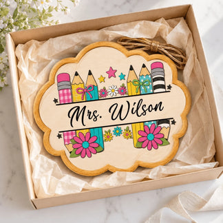 Personalized wooden sign for teachers featuring pencils and flowers packaged in a gift box for teacher appreciation.