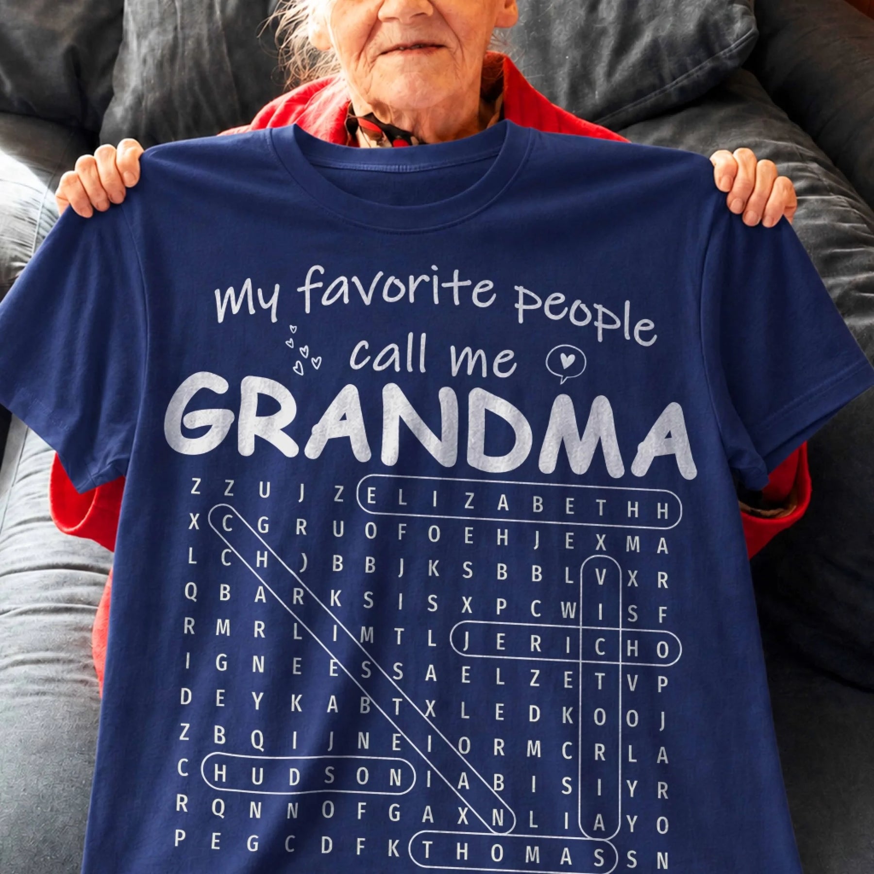 Personalized Grandma navy T-shirt featuring a custom name word search design, a heartwarming gift for any grandmother.