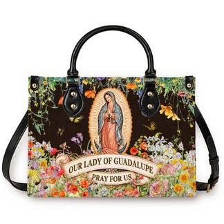 This religious tote bag features Our Lady of Guadalupe surrounded by vibrant wildflowers and butterflies for daily use.