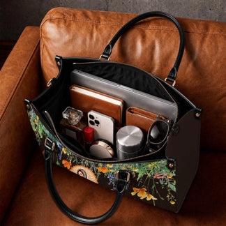 This spacious PU leather tote features a vibrant Our Lady of Guadalupe floral design, perfect for organizing daily essentials.