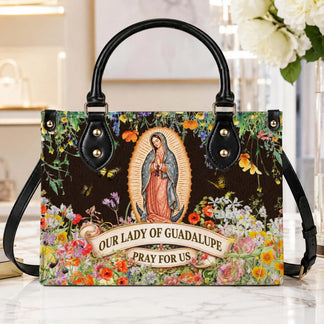 Beautiful Our Lady of Guadalupe handbag with a floral background and butterflies, perfect as a thoughtful spiritual gift.