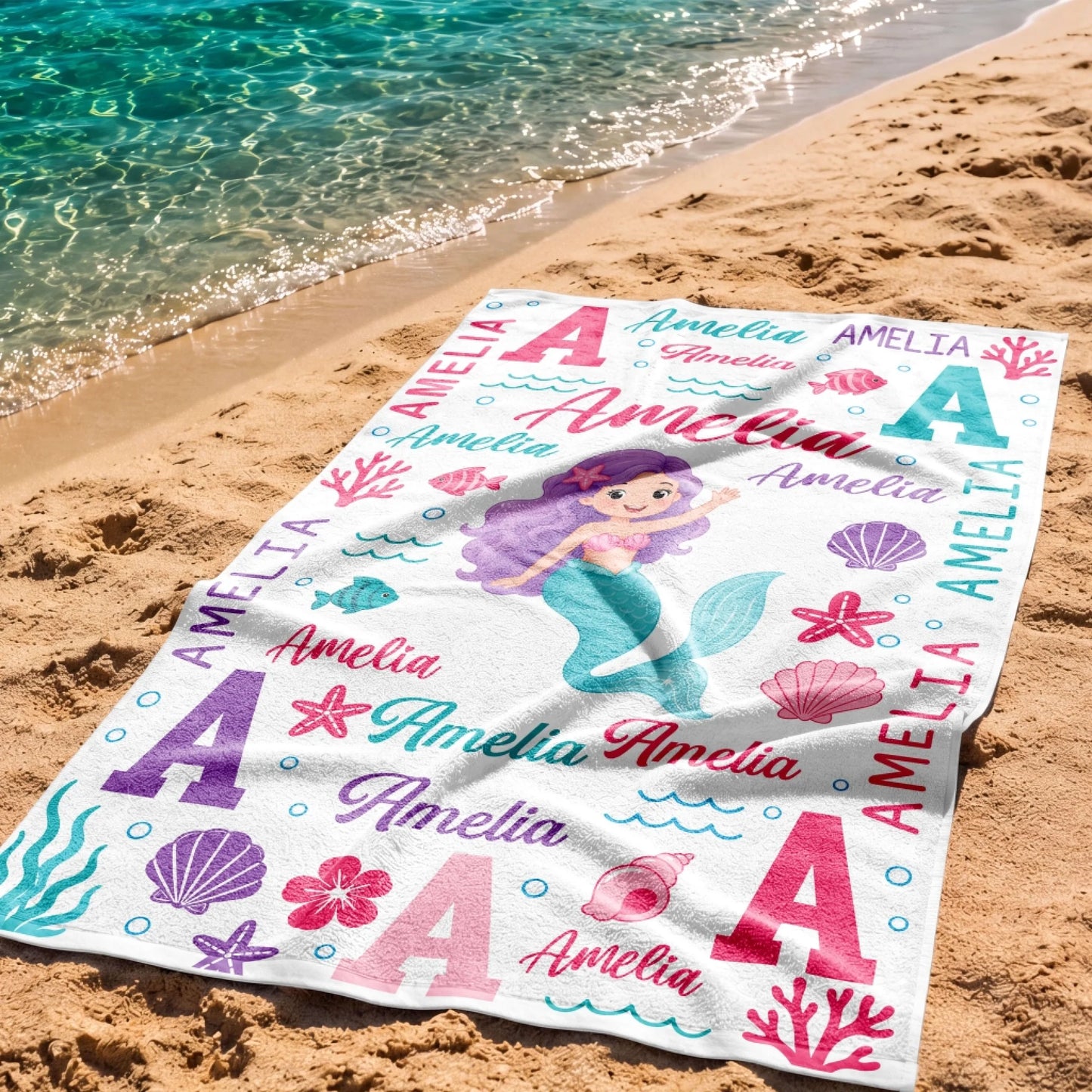 Personalized mermaid theme beach towel with custom name, featuring colorful sea creatures for summer pool parties.