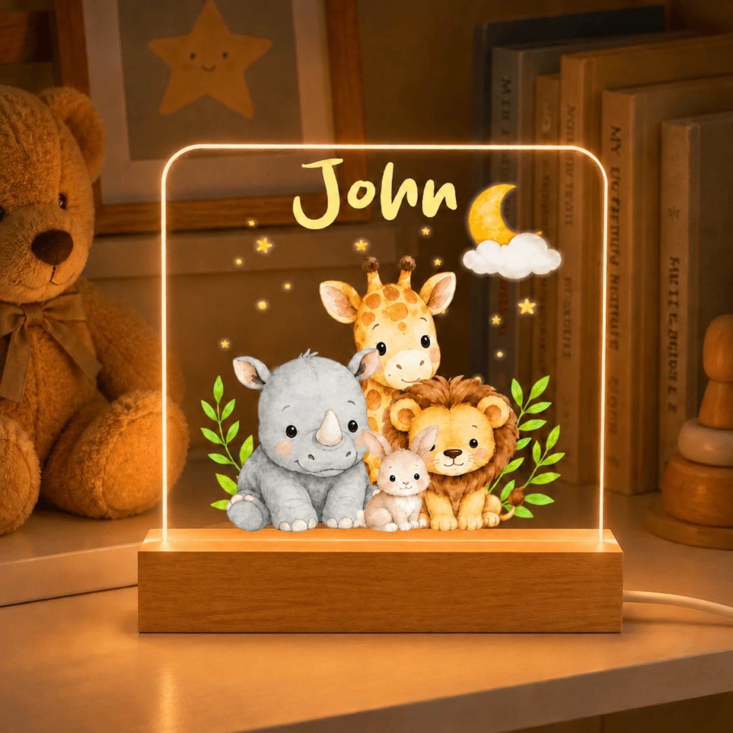 Custom name nursery night light featuring a cute giraffe lion rhino and bunny illustration on an acrylic lamp base.