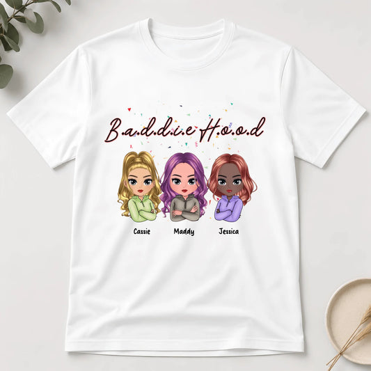 White t-shirt with cartoon characters and names on a white background