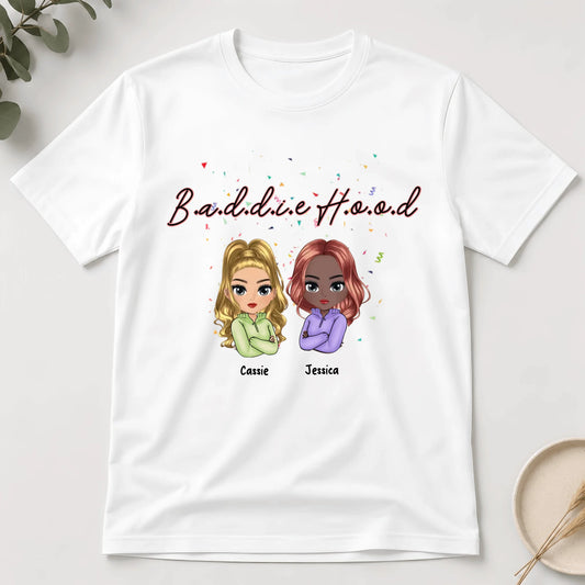 White t-shirt with cartoon characters and text on a white background