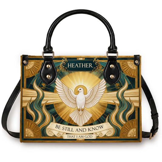 Personalized tote bag featuring a white dove, gold sunburst, and the religious quote Be Still And Know That I Am God.