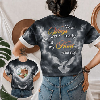 Personalized bereavement t-shirt featuring a custom photo, memorial quote, and dove imagery on dark clouds.