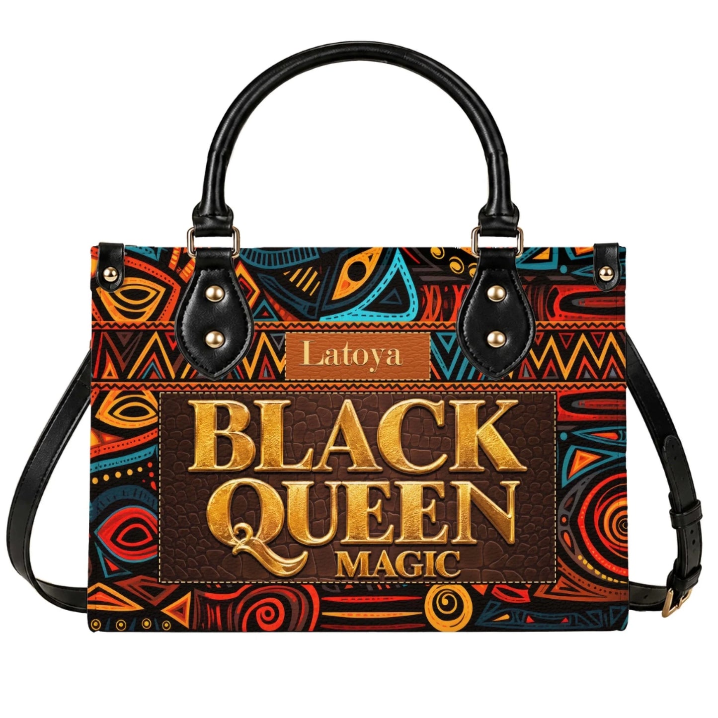 Personalized Black Queen Magic handbag featuring a vibrant African tribal print design and a custom name label tag.