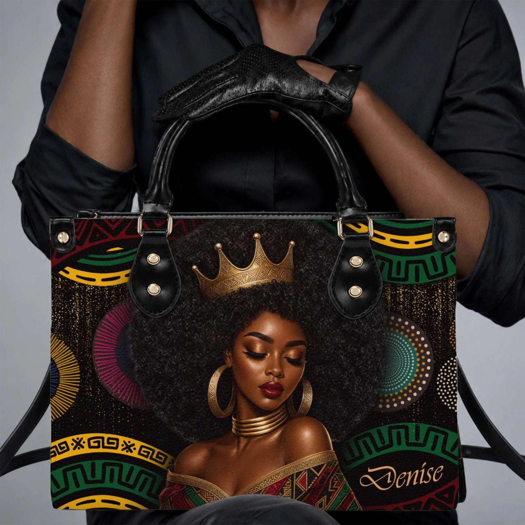 Fashionable Black queen tote bag with crown art held by a woman in a black shirt for a chic gift idea.