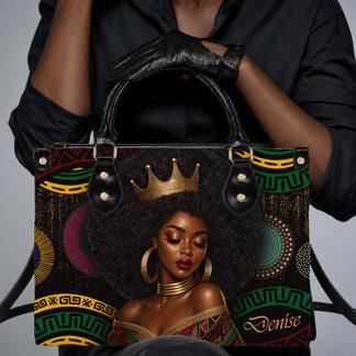 Fashionable Black queen tote bag with crown art held by a woman in a black shirt for a chic gift idea.