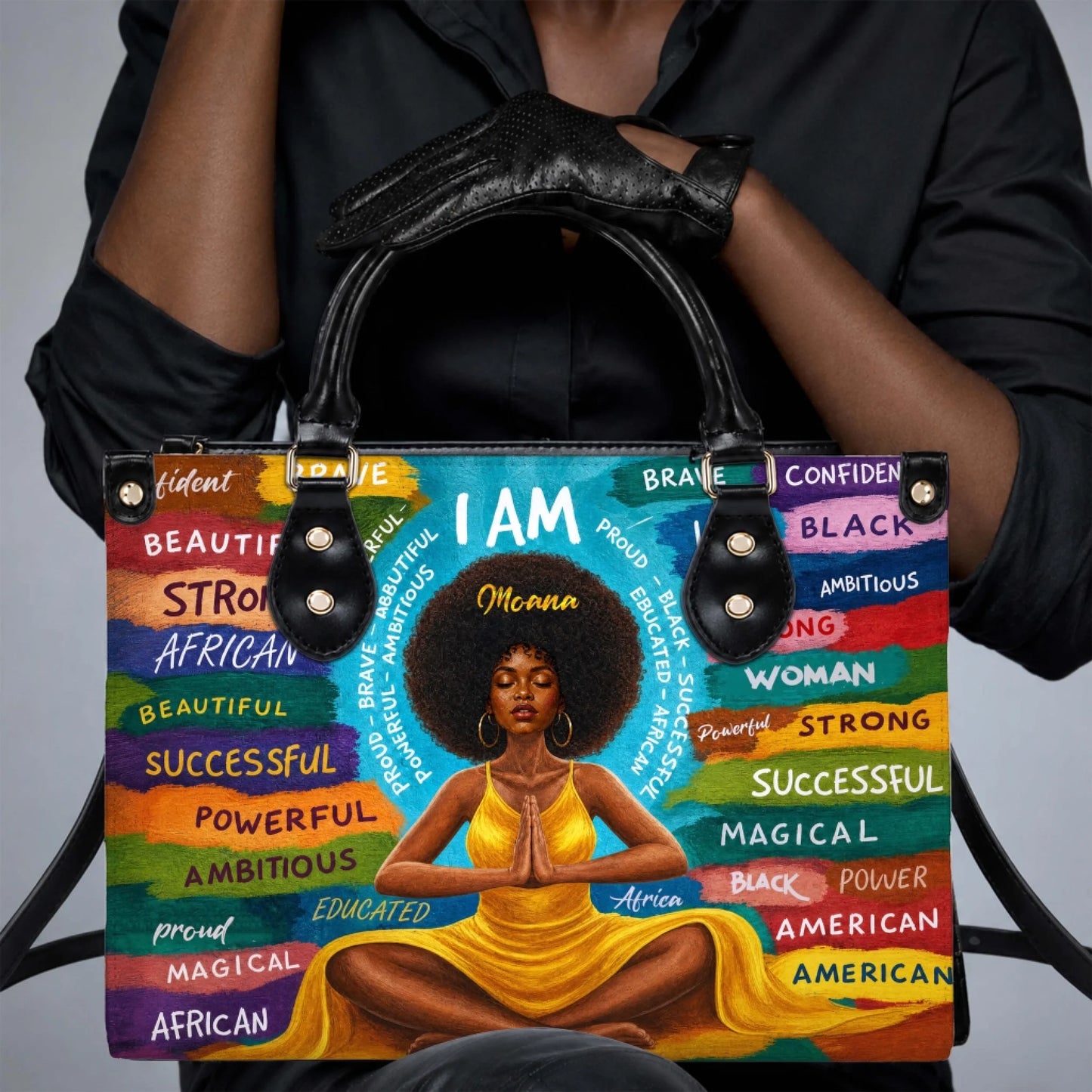 A stylish personalized PU leather handbag featuring a Black woman in a yellow dress meditating with empowering words.