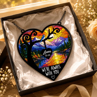 Heart shaped stained glass style acrylic suncatcher featuring a blue jay and memorial text as a sympathy gift for loved ones.