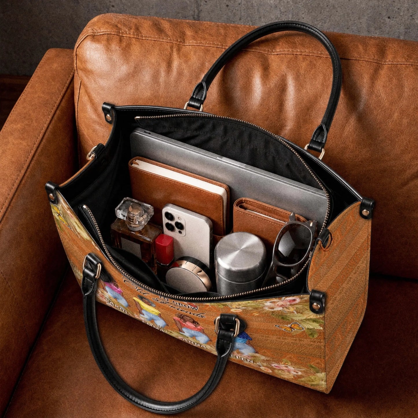Spacious interior of a personalized boho tote bag featuring a floral design filled with personal items and accessories.