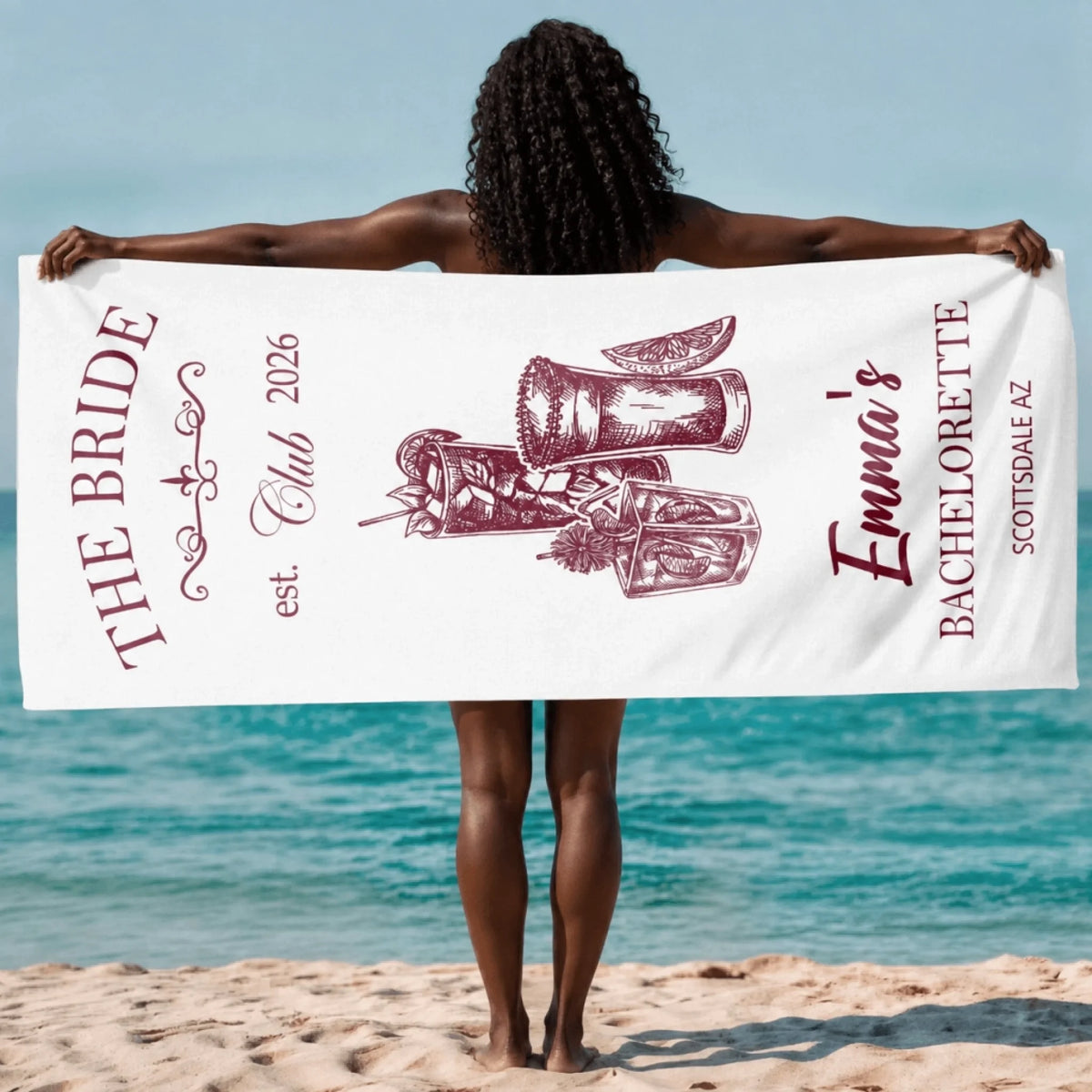 Custom bridal bachelorette party beach towel featuring cocktail illustrations and personalized name text.