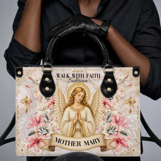 Handbag featuring a praying angel and custom text Walk With Faith Sabrina suitable for memorial tribute gifts