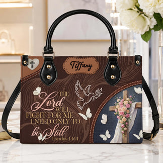 Personalized brown tote bag featuring a cross with flowers, butterflies, and the scripture quote Exodus 14 14 for faith.