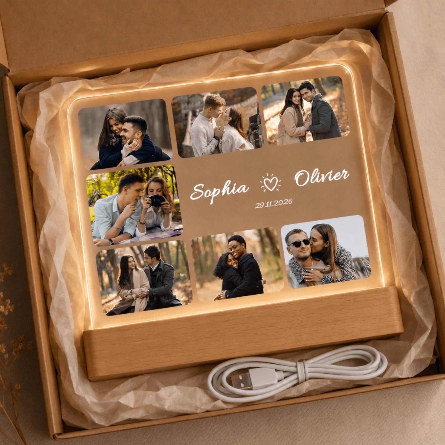 Personalized acrylic LED night light gift featuring a seven photo collage and names in a shipping box with USB cable.