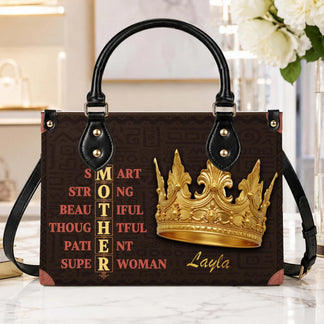 A beautiful personalized handbag for mom with a golden crown illustration and the name Layla, displayed in a home.