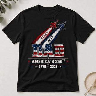 Patriotic dad t-shirt for America 250th anniversary featuring custom names Clara and John with military jet graphics.