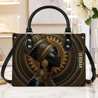A luxury personalized PU leather handbag featuring an elegant African queen design with the name Deborah in gold.