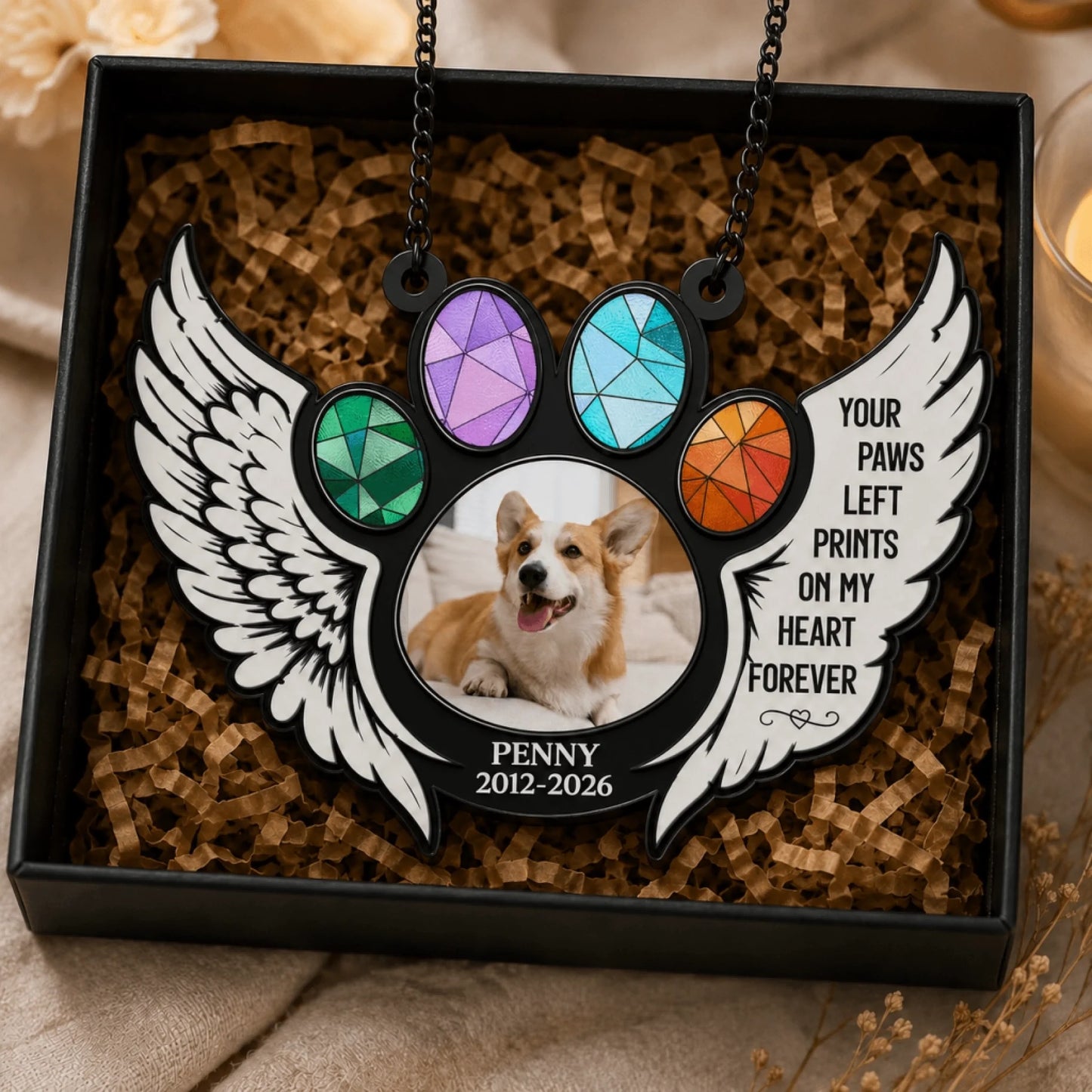 Customized dog memorial gift set in a box with a stained glass style paw print, angel wings, and a sentimental poem for lost pets.