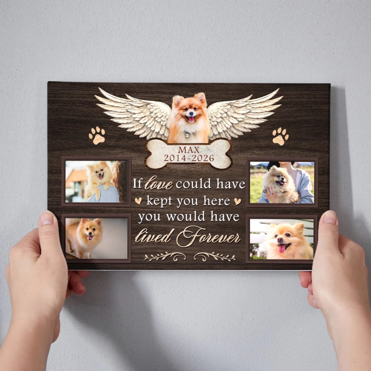 Close up of a custom dog memorial canvas with four photos, angel wings, and dates to honor a beloved lost pet.