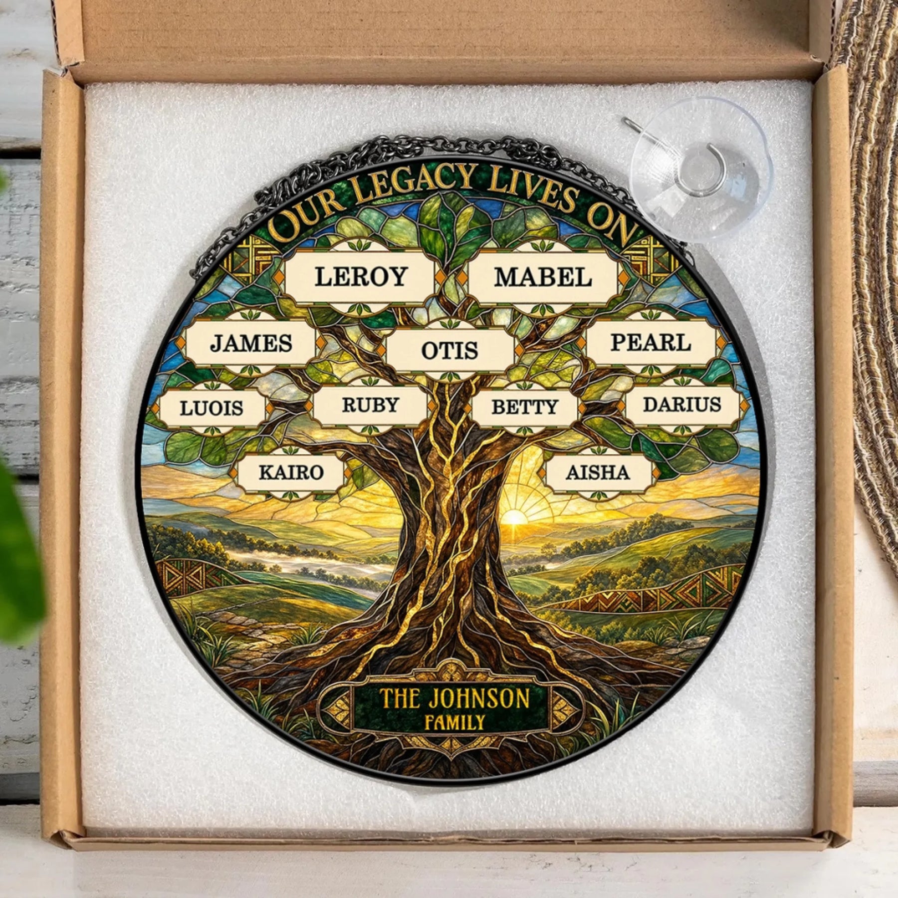 Custom family tree acrylic suncatcher gift in a box, featuring names like Otis and Ruby for a meaningful family keepsake.
