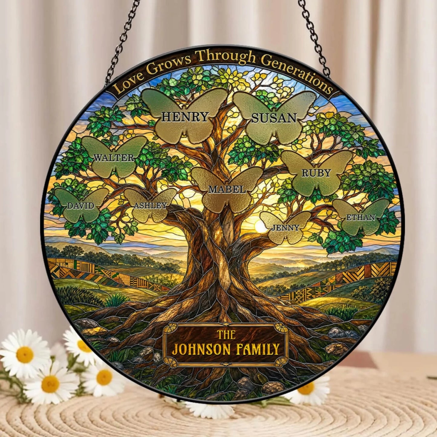 Personalized family tree acrylic suncatcher featuring butterfly name engravings and the quote Love Grows Through Generations.