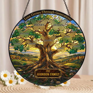 Personalized family tree acrylic suncatcher featuring butterfly name engravings and the quote Love Grows Through Generations.
