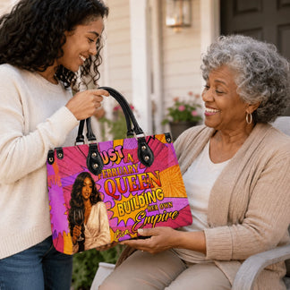 A daughter gifting a personalized February Queen handbag to her grandmother, featuring custom name and bold design.
