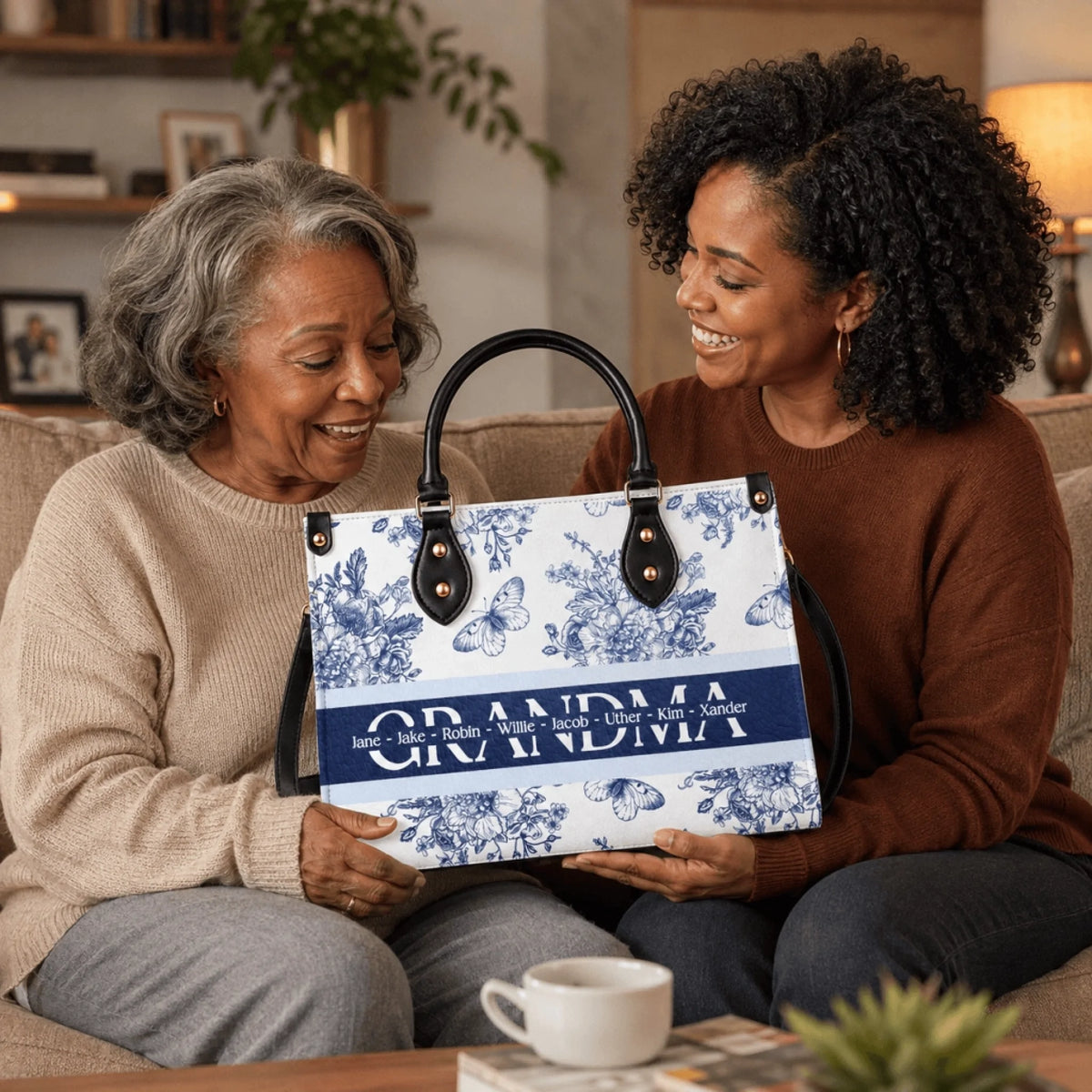 A senior woman holding a personalized floral tote bag with the name Grandma and grandchildren names, a sentimental gift.