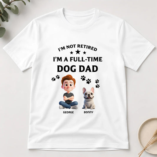 White t-shirt with a graphic of a man and a dog, text 'I'm not retired, I'm a full-time dog dad', and names 'George' and 'Bonny'.