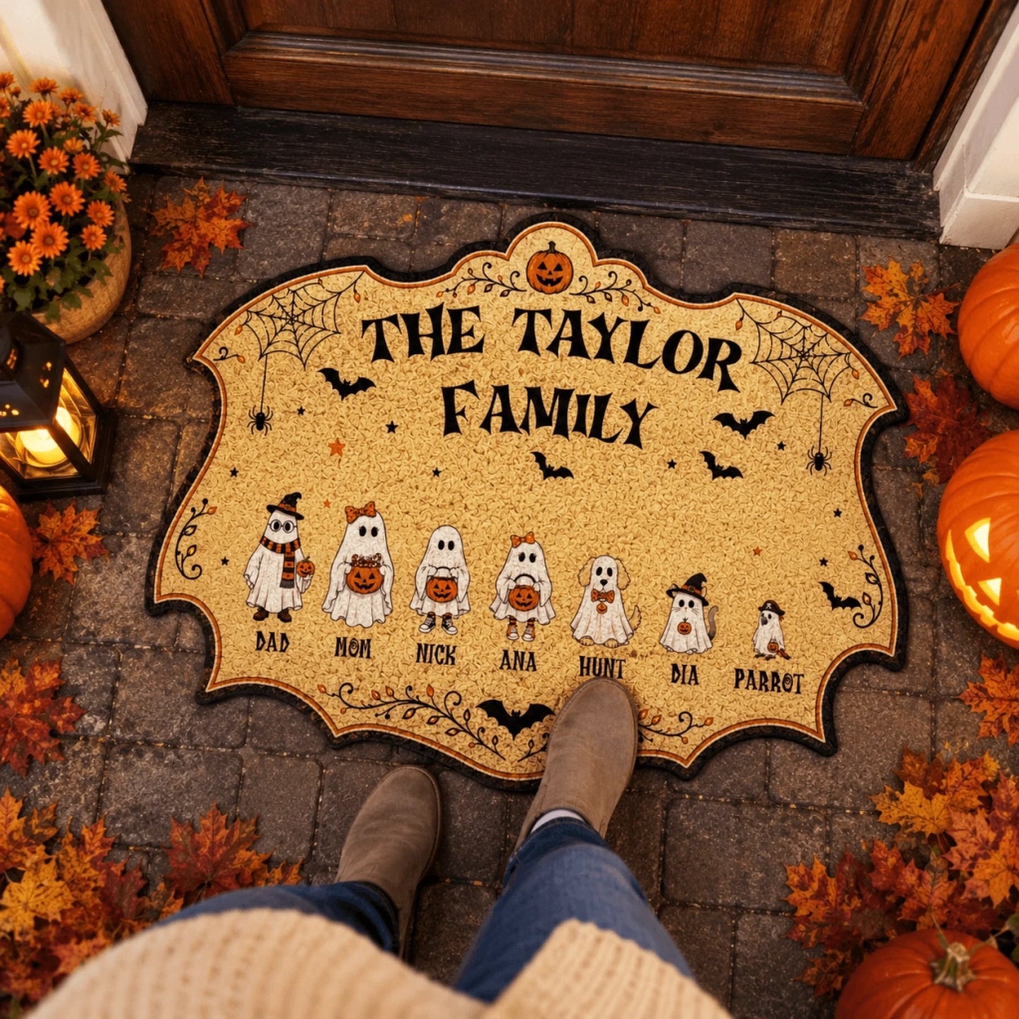 Personalized ghost family doormat for Halloween placed on a stone porch, featuring names and cute spooky characters.