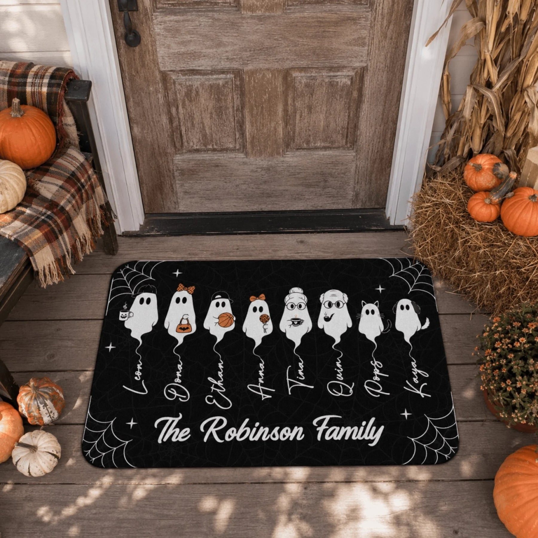 Custom halloween doormat featuring a personalized ghost family and names, a festive gift for home decoration.