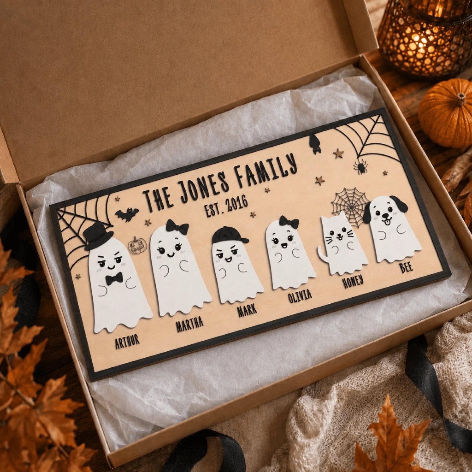 Customized ghost family wooden sign displayed inside a gift box, ideal for a unique and thoughtful Halloween gift.
