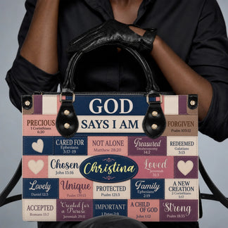 A woman holding a personalized PU leather handbag featuring God Says I Am scripture quotes and the name Christina.