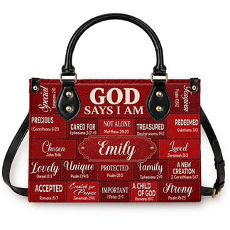 A personalized red leather handbag featuring inspirational scripture verses and the custom name Emily in a block design.